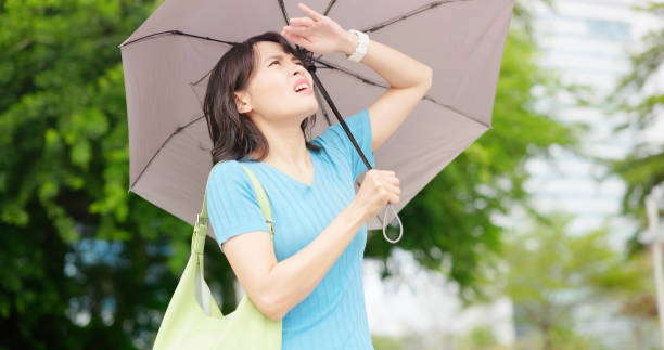 istock asian woman stand outdoors pain 2150984372