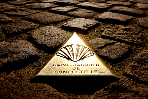 Bronze plaque that marks the beginning of the French route to Santiago de Compostela in Saint-Jean-Pied-de-Port, France