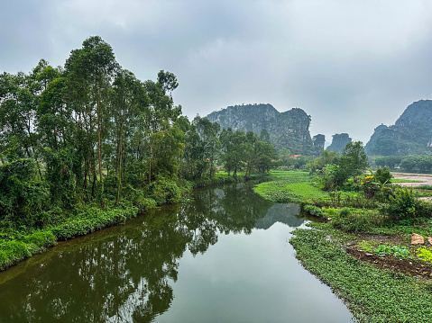 Karst formations and  river, Ninh Binh province, Vietnam