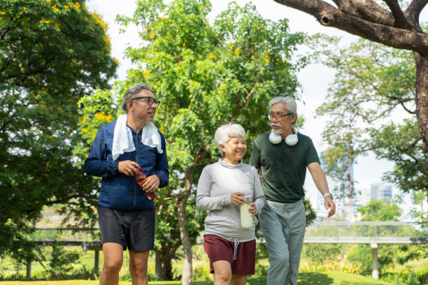 istock Group of Asian senior walking in public park 2150988161
