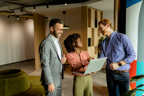 istock Creative team engaging in a lively brainstorming session at a colorful office space 2150994246