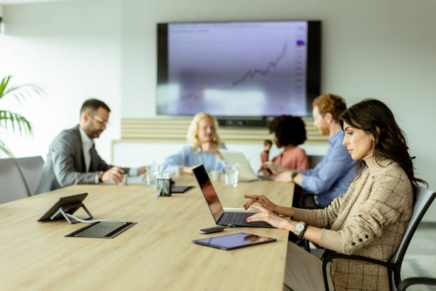 istock Strategic team meeting at a bright office space discussing growth metrics 2150994250