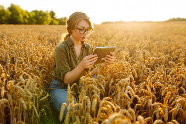 istock Digital tablet in the hands of a young farmer. 2150996055
