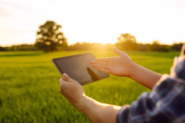 istock Digital tablet in the hands of a young farmer. 2150998392