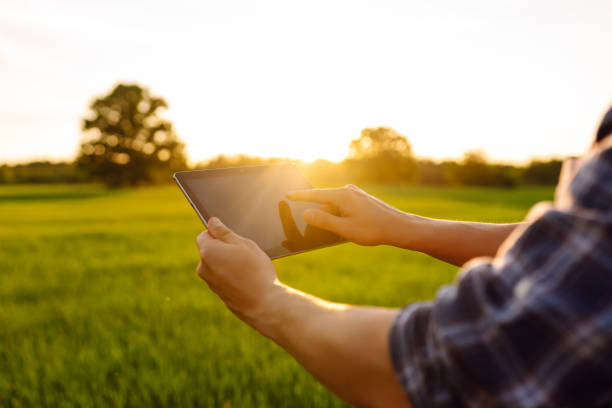 istock Digital tablet in the hands of a young farmer. 2150998393