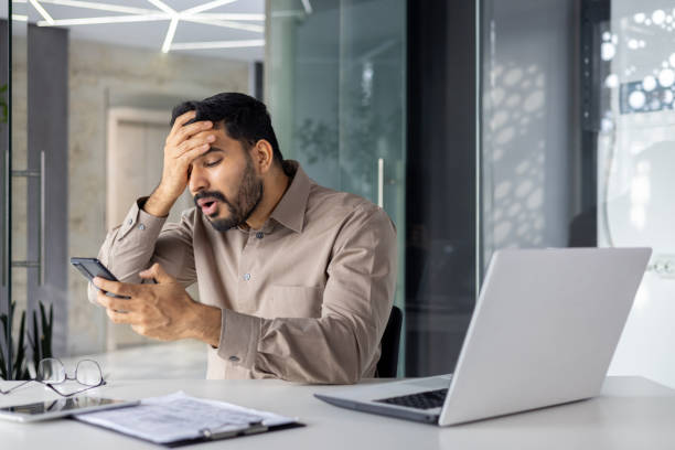 istock Indian businessman feeling confused and stressed in office 2151000250