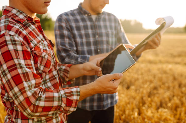 istock Tablet in the hand of farmers. 2151001014