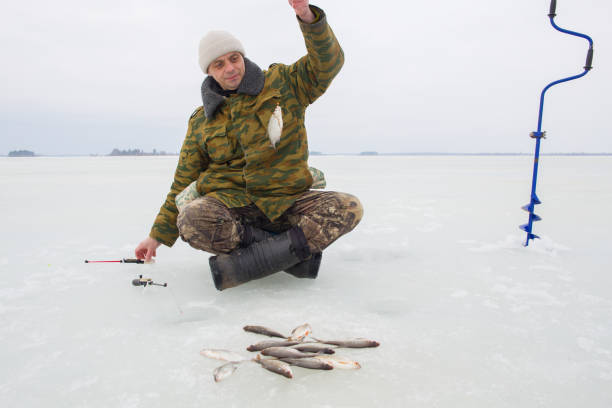 istock winter fishing 2151002357