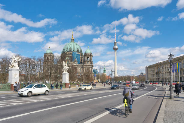 Berlin, Germany – March 28, 2024: Street scene in Berlin-Mitte, Berlin Cathedral and television tower in the background