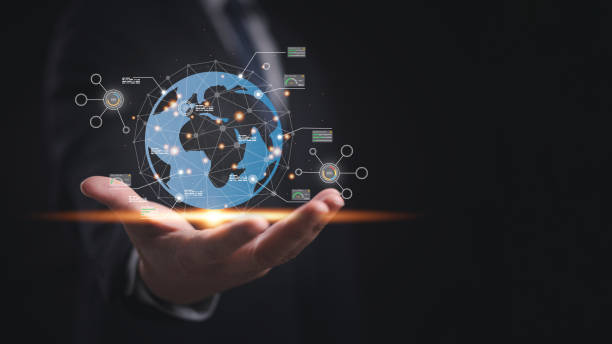 istock A man is holding a globe in hand that with network connection lines, dots and analysis graph in concept of AI analysis technology, innovation and worldwide business transformation. 2151003119