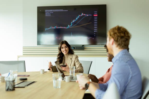istock Dynamic corporate strategy session in a modern boardroom on a bright afternoon 2151003743