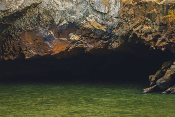 istock Cave on the river in the mountains. Beautiful natural background. 2151004272