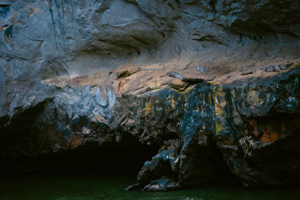 istock Cave on the river in the mountains. Beautiful natural background. 2151004347