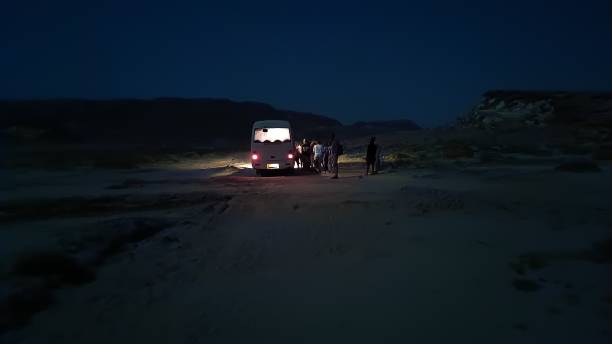 istock Bus at the beach at night 2151006916