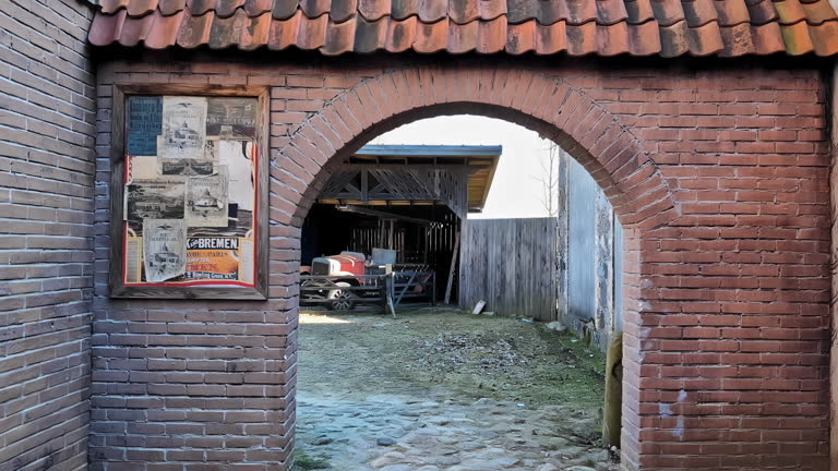 Old medieval building entrance arch in Bremen Germany old tractor