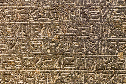 Old egyptian hieroglyphic carvings.
