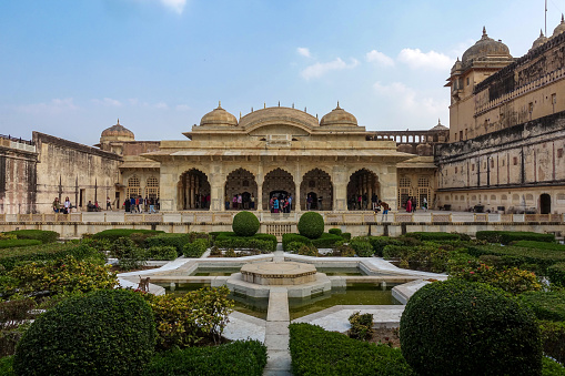 The Garden in front of Sukh mandir, Amer Fort (Amber Fort and Amber Palace). Amer Fort is known for its artistic Hindu-style elements. With its large ramparts series of gates and cobbled paths, the fort overlooks Maota Lake. Amer Fort, along with five other forts of Rajasthan, was declared a UNESCO World Heritage Site