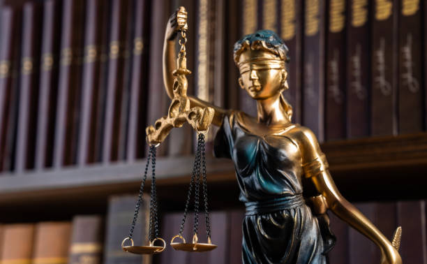 istock Justice blindfolded lady holding scales 2151015009