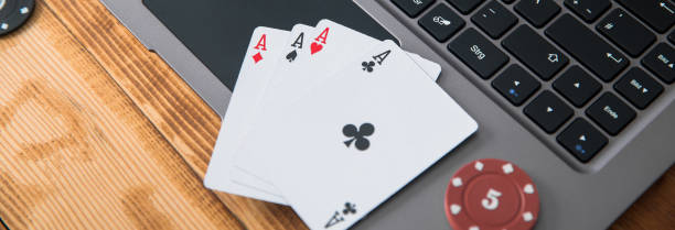 istock online poker with laptop and chips 2151015374