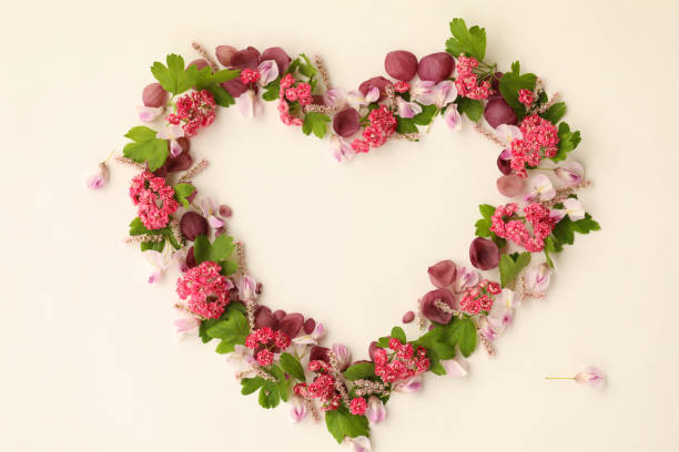 istock Heart shaped botanical frame with flowers 2151016060