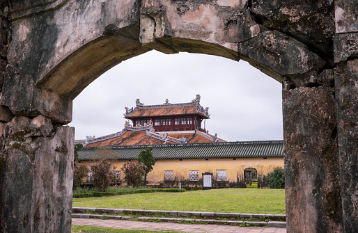 Oriental red monument in Imperial City, Hue. Ruins in Citadel famous landmark of Vietnam.