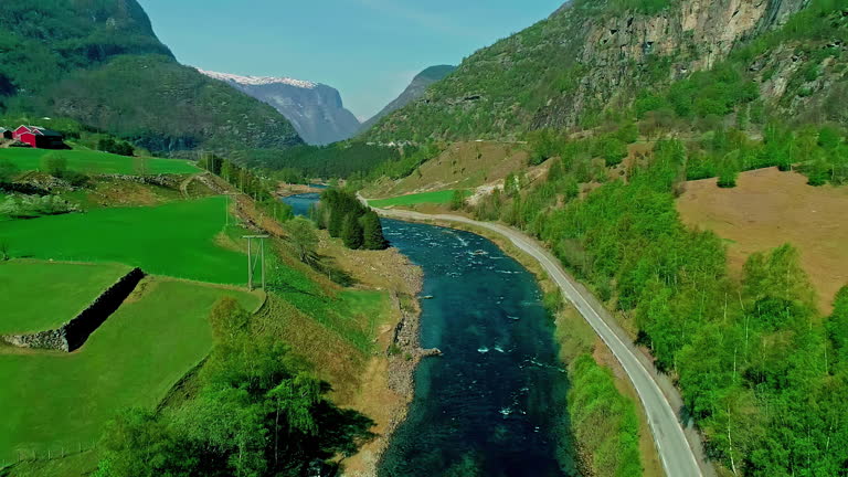 Scenic Aerial View Of Flam Village Norway Picturesque Valley And River drone video