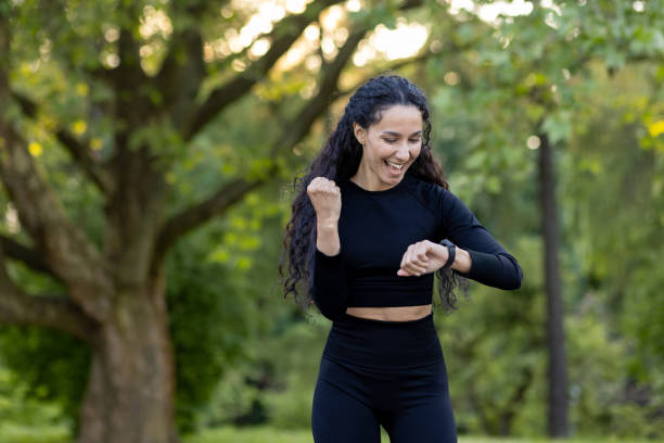 Hispanic woman enjoying a successful workout in the park