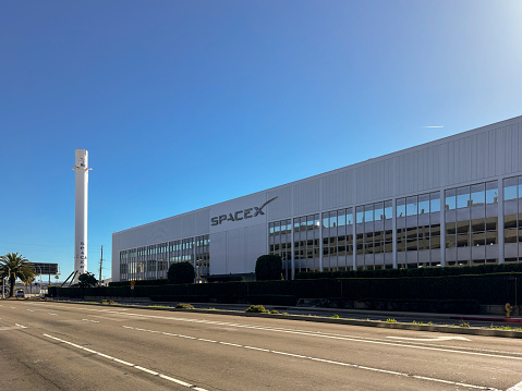 Hawthorne, California, USA-June 27, 2024: Exterior view of SpaceX headquarters located in Hawthorne, California. Photographed on the street level of Crenshaw Blvd. SpaceX is the aerospace firm founded by Elon Musk.