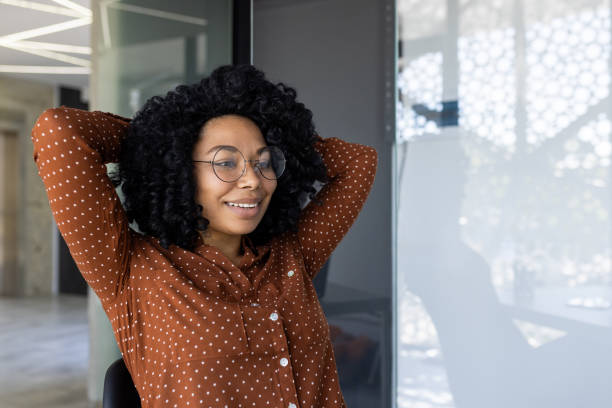 istock Young professional woman enjoying a peaceful break at office 2151032883