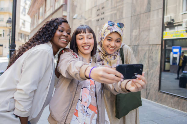 istock Happy young people spending time together outside 2151033432