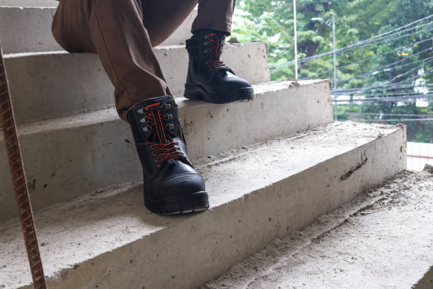istock A construction worker wears brown leather boots which look very cool 2151036301