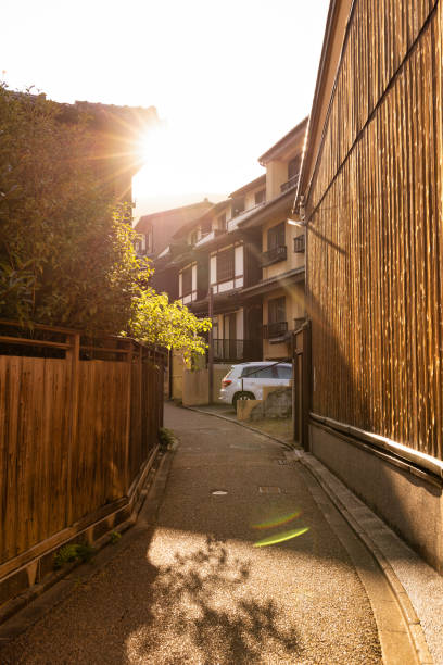 The small back alley streets of Kyoto, Japan during golden hour sunset.