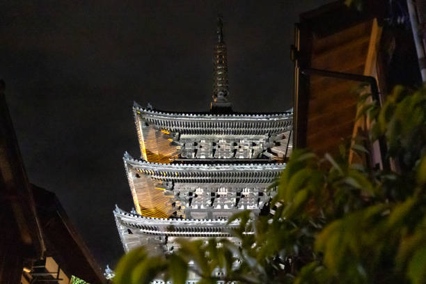 Kyoto, Japan - October 9, 2023: The Yasaka Pagoda and Sannen Zaka Street with no people in the street, Gion district in Kyoto, Japan at night.