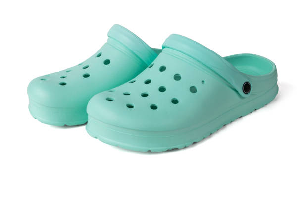 istock Light green rubber women's flip-flops insulated on a white background. 2151044804