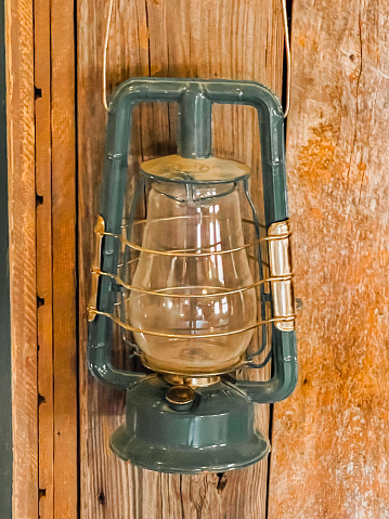 A vintage gas lantern hanging