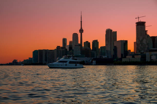 Evening view of Downtown Vancouver from Coal Harbor and Burrard Inlet, British Columbia
