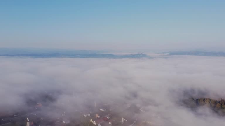 Over the clouds magical fog cinematic droneshot