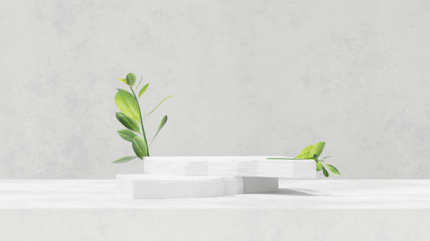 istock Empty podium display made of white stone and leaf for showcasing merchandise 2151053779