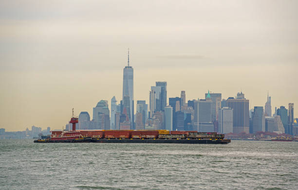 Industrial ship at the East River with Lower Manhattan