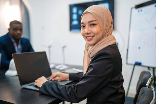 istock Successful businesswoman working at her office desk. 2151061459