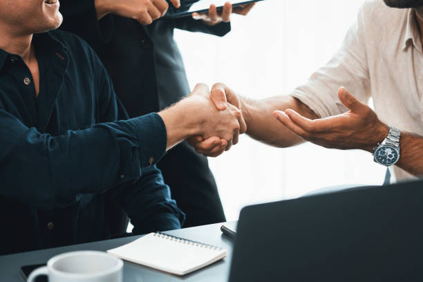 istock Group of diverse office worker employee shake hand and working together. Prudent 2151061822
