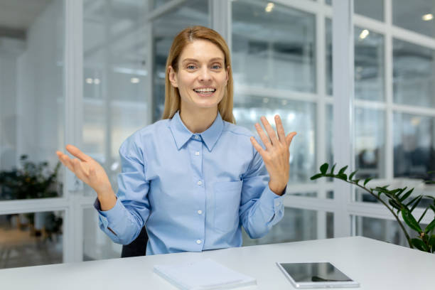 istock Business professional engaging in a lively video call 2151065930