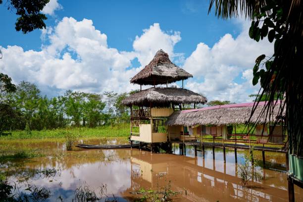 istock Amazon Jungle Lodge with Beautiful Blue Sky - Peru Stock Photo 2151067090