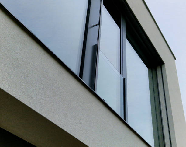 istock We installed prepared anchors from aluminum mobile scaffolding using stainless steel rails. railing is made of hardened, glued safety film and protects children from falling out when window open 2151068719