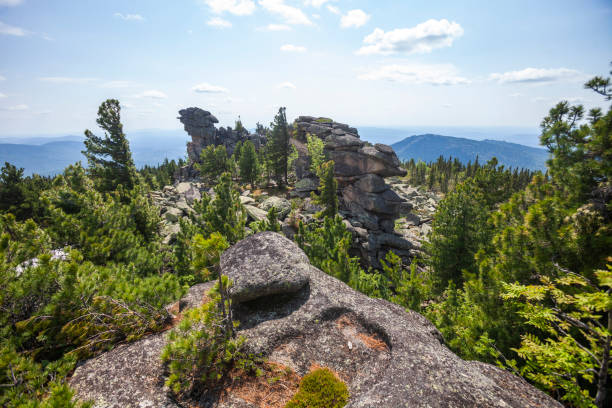 istock Remnants pillars on Mount Zelenaya. Sheregesh, Russia 2151069283