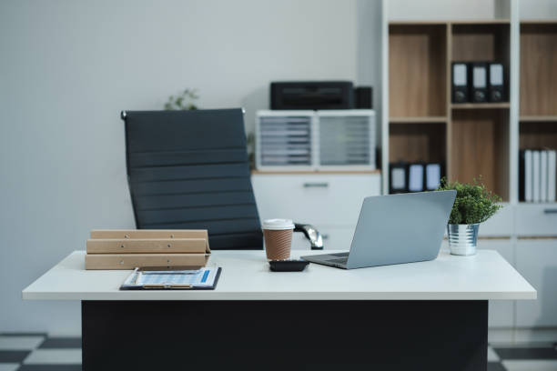 istock workspace area with laptop tablet smartphone and paperwork on the table in the office concept. 2151069367