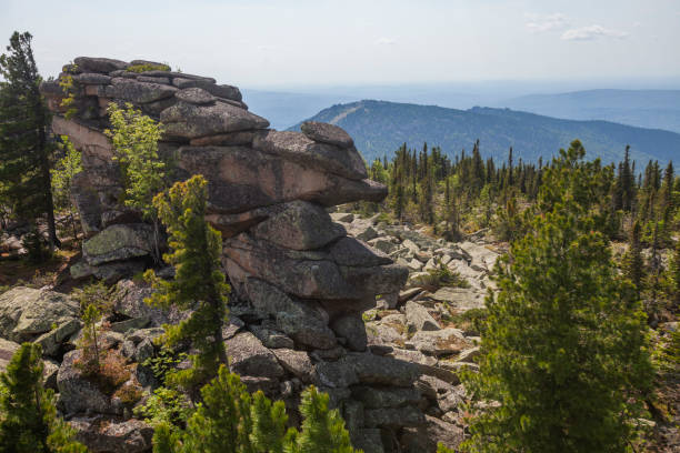 istock Remnants pillars on Mount Zelenaya. Sheregesh, Russia 2151069457