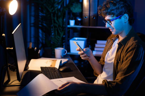 istock Businessman using smartphone to search email, chatting with customer. Gusher. 2151072140