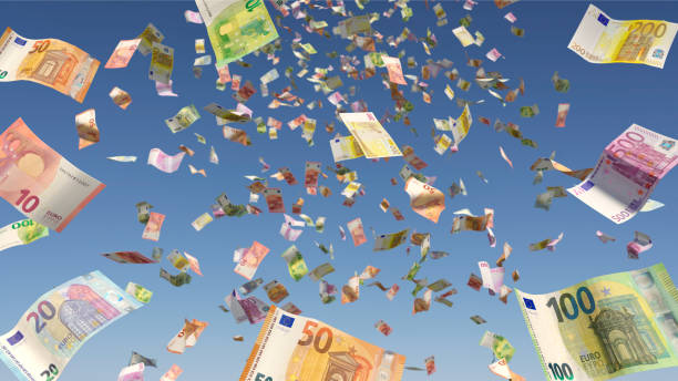 Money rain (Euro notes) from a blue sky Symbolic image: Money rain (Euro notes) from a blue sky pennies from heaven stock pictures, royalty-free photos & images