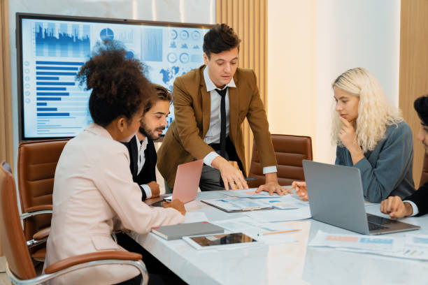 istock Professional smart business team discussion about start up project. Ornamented. 2151073493